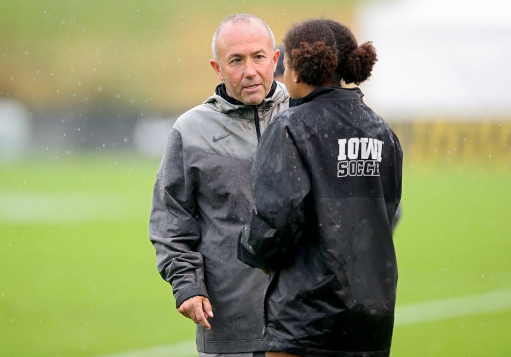 Iowa head coach Dave DiIanni talks with midfielder/forward Melina Hegelheimer (26) during the second half of their match at the Iowa Soccer Complex in Iowa City on Sunday, Sep 29, 2019. (Stephen Mally/hawkeyesports.com)