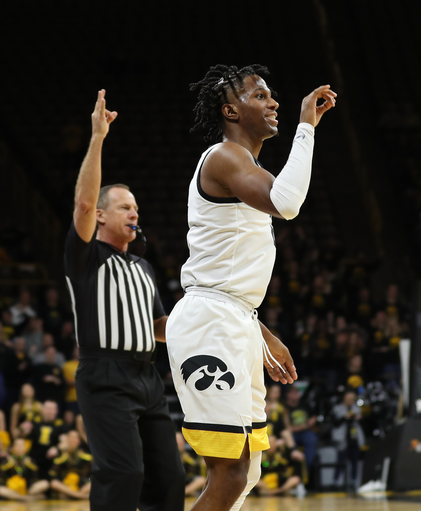 Iowa Hawkeyes guard Bakari Evelyn (4) celebrates a three point basket against the Maryland Terrapins Friday, January 10, 2020 at Carver-Hawkeye Arena. (Brian Ray/hawkeyesports.com)