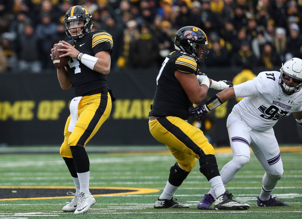 Iowa Hawkeyes quarterback Nate Stanley (4) drops back to pass during a game against Northwestern at Kinnick Stadium on November 10, 2018. (Tork Mason/hawkeyesports.com)