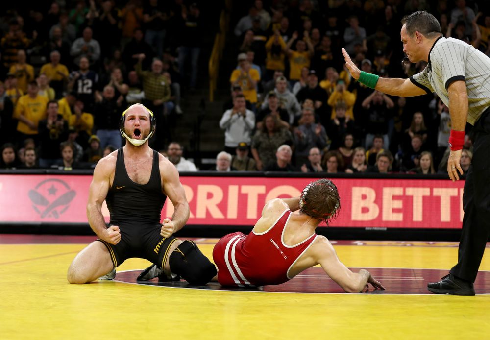 IowaÕs Alex Marinelli wrestles WisconsinÕs Evan Wick at 165 pounds Sunday, December 1, 2019 at Carver-Hawkeye Arena. Marinelli won the match 4-2. (Brian Ray/hawkeyesports.com)