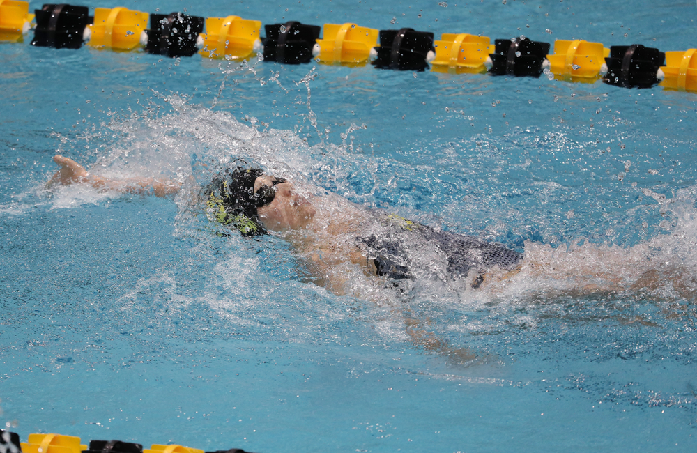 IowaÕs Julia Koluch competes in the 100 yard backstroke against Notre Dame and Illinois Saturday, January 11, 2020 at the Campus Recreation and Wellness Center. (Brian Ray/hawkeyesports.com)