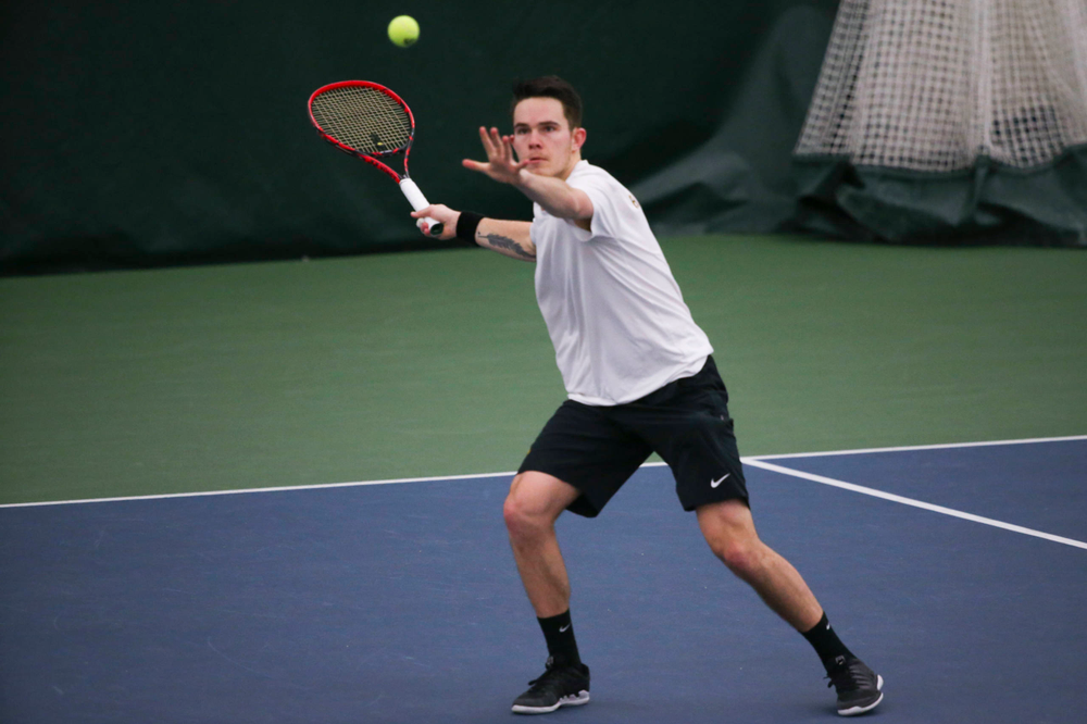 Iowa's Jonas Larsen at a tennis match vs Drake Friday, March 8, 2019 at the Hawkeye Tennis and Recreation Complex. (Lily Smith/hawkeyesports.com)