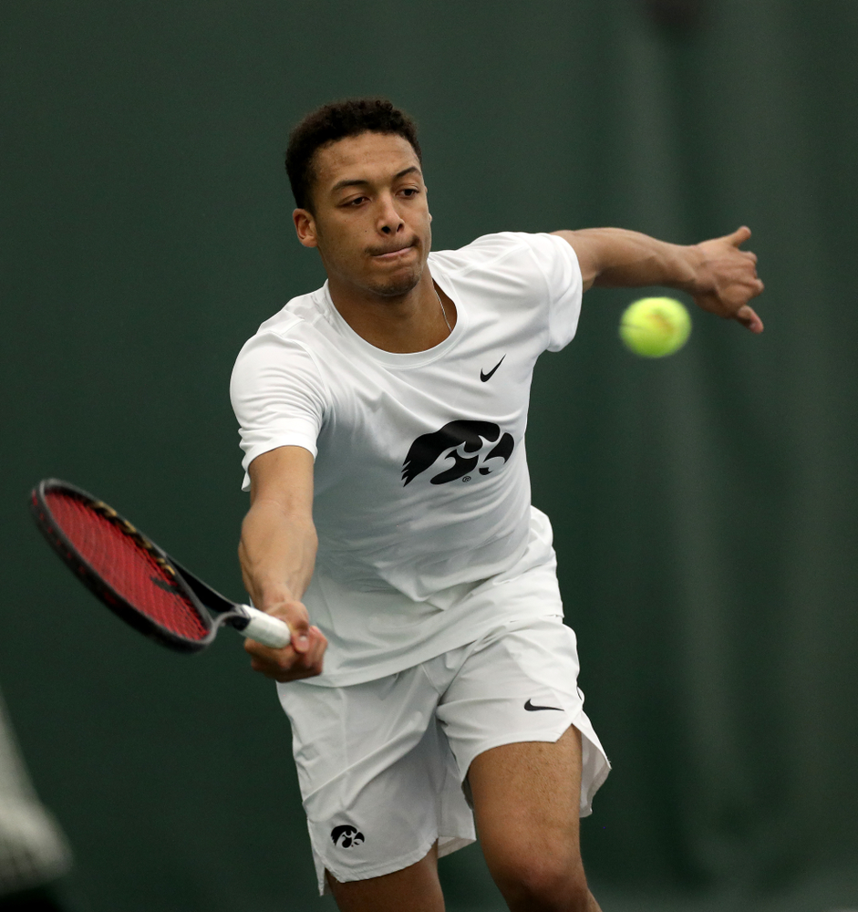 Iowa’s Oliver Okonkwo against Cornell Sunday, March 8, 2020 at the Hawkeye Tennis and Recreation Center. (Brian Ray/hawkeyesports.com)
