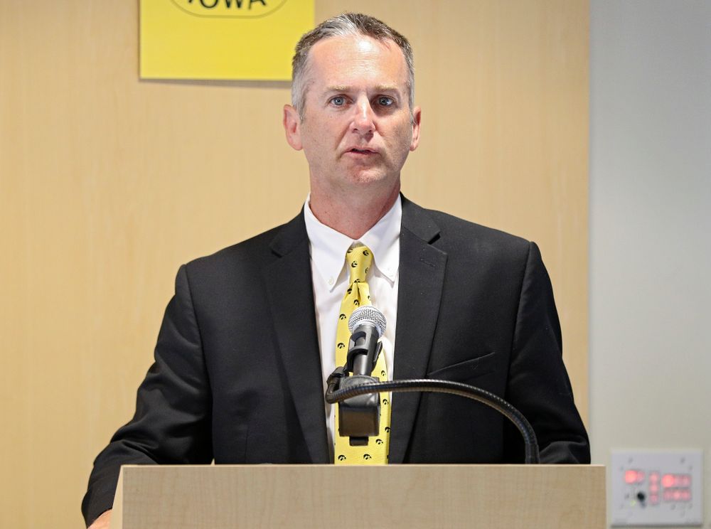 Josh Schamberger, president of Iowa City/Coralville Area Convention & Visitors Bureau, speaks during the press conference to discuss FryFEST and announce the 2019 Iowa Athletics Hall of Fame members in the Varsity Club Room at the University of Iowa Athletics Hall of Fame in Iowa City on Tuesday, Jun 11, 2019. (Stephen Mally/hawkeyesports.com)