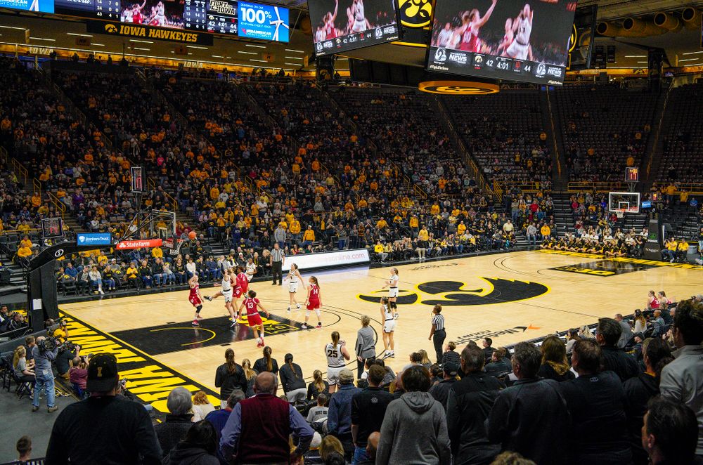 Iowa Hawkeyes fans stand as forward Amanda Ollinger (43) makes a basket while being fouled during the third quarter of their game at Carver-Hawkeye Arena in Iowa City on Sunday, January 12, 2020. (Stephen Mally/hawkeyesports.com)
