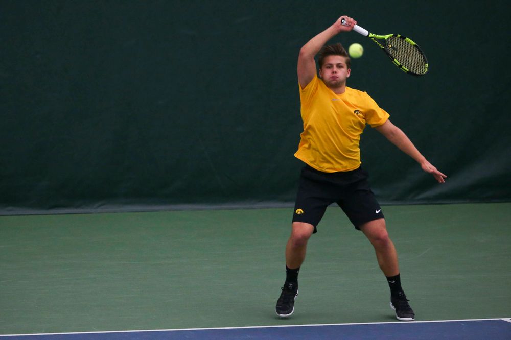 Iowa's Will Davies at a tennis match vs Drake Friday, March 8, 2019 at the Hawkeye Tennis and Recreation Complex. (Lily Smith/hawkeyesports.com)