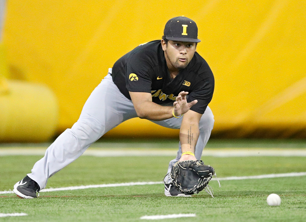 Iowa Hawkeyes infielder Izaya Fullard (20) fields a ball during practice at the Hansen Football Performance Center in Iowa City on Friday, January 24, 2020. (Stephen Mally/hawkeyesports.com)