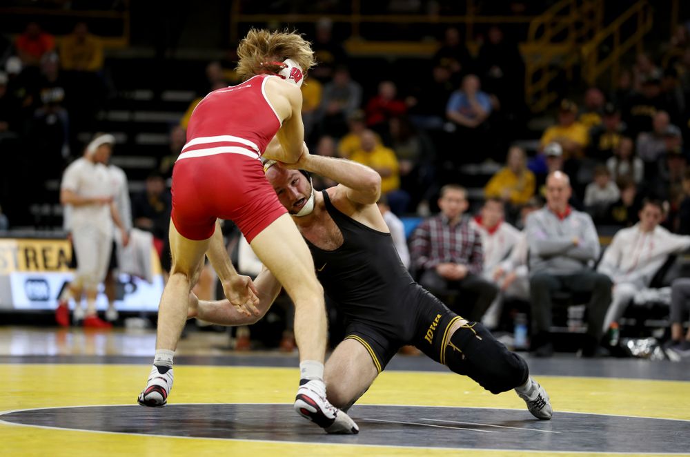 IowaÕs Alex Marinelli wrestles WisconsinÕs Evan Wick at 165 pounds Sunday, December 1, 2019 at Carver-Hawkeye Arena. Marinelli won the match 4-2. (Brian Ray/hawkeyesports.com)