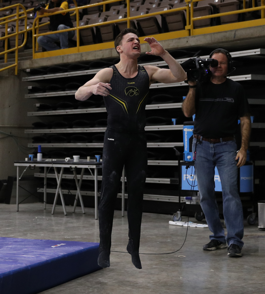 Iowa's Jake Brodarzon cheers on his teammates during their meet against the Ohio State Buckeyes Saturday, March 16, 2019 at Carver-Hawkeye Arena. (Brian Ray/hawkeyesports.com)