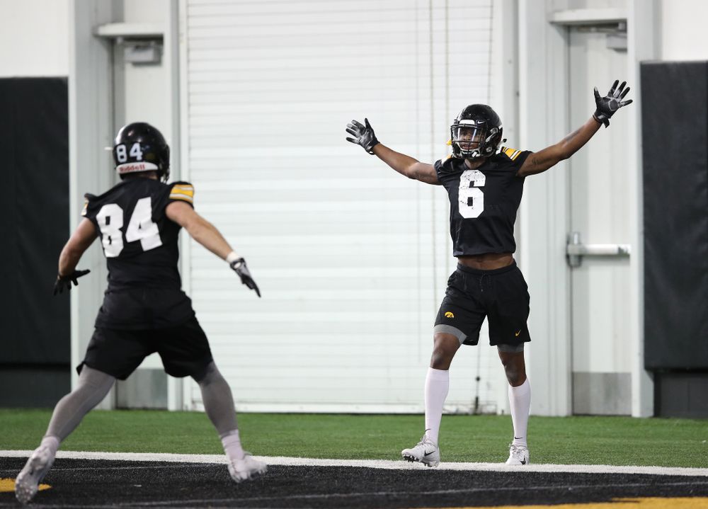 Iowa Hawkeyes wide receiver Ihmir Smith-Marsette (6) and wide receiver Nick Easley (84) during preparation for the 2019 Outback Bowl Tuesday, December 18, 2018 at the Hansen Football Performance Center. (Brian Ray/hawkeyesports.com)