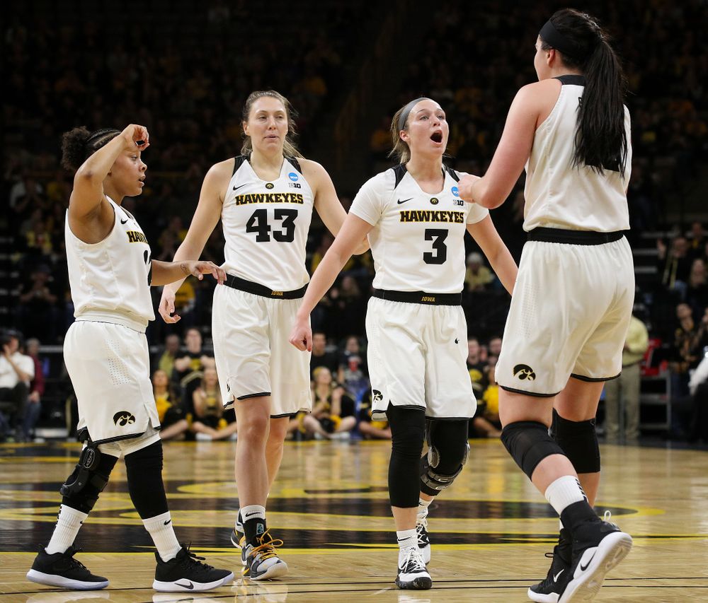 Iowa Hawkeyes guard Tania Davis (11), forward Amanda Ollinger (43), guard Makenzie Meyer (3), and forward Megan Gustafson (10) during the first round of the 2019 NCAA Women's Basketball Tournament at Carver Hawkeye Arena in Iowa City on Friday, Mar. 22, 2019. (Stephen Mally for hawkeyesports.com)