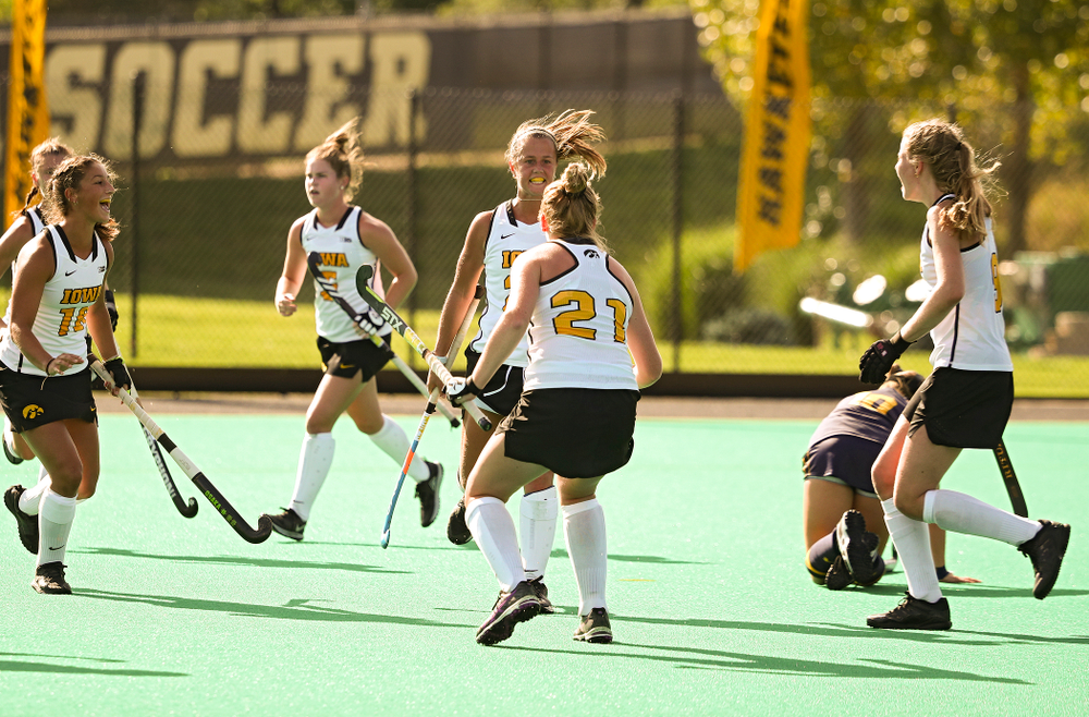 Iowa’s Sophie Sunderland (20) celebrates her goal during the third quarter of their game at Grant Field in Iowa City on Friday, Sep 13, 2019. (Stephen Mally/hawkeyesports.com)