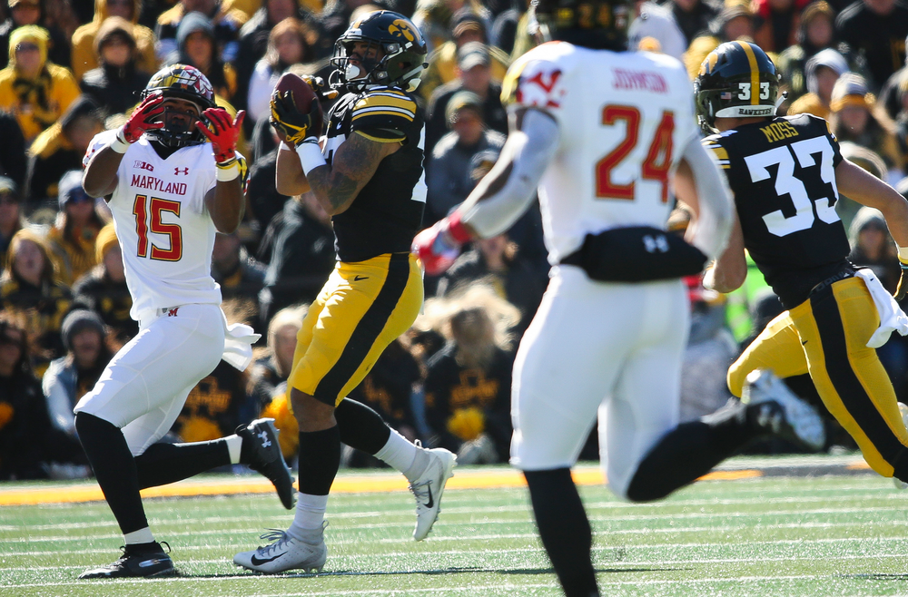 Iowa Hawkeyes defensive back Amani Hooker (27) makes an interception during a game against Maryland at Kinnick Stadium on October 20, 2018. (Tork Mason/hawkeyesports.com)