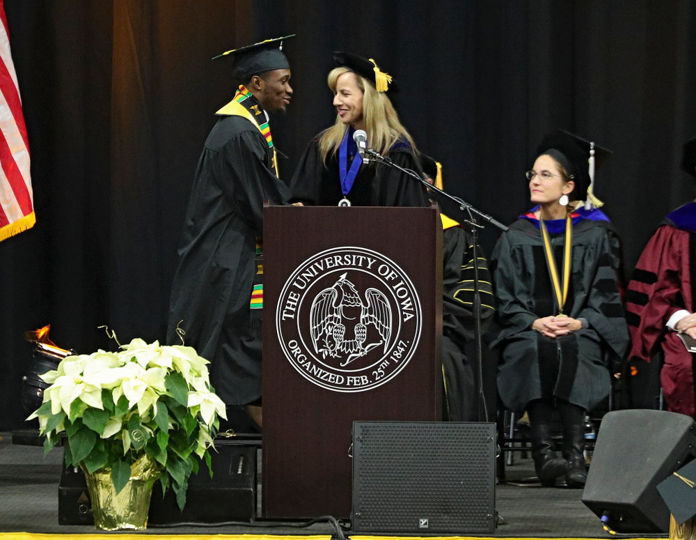 Iowa Track and Field’s Karayme Bartley during the College of Liberal Arts and Sciences and University College Fall 2019 Commencement ceremony at Carver-Hawkeye Arena in Iowa City on Saturday, December 21, 2019. (Stephen Mally/hawkeyesports.com)