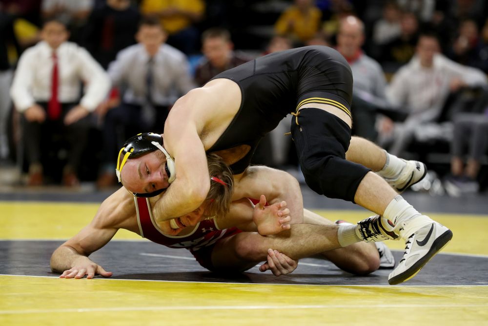 IowaÕs Alex Marinelli wrestles WisconsinÕs Evan Wick at 165 pounds Sunday, December 1, 2019 at Carver-Hawkeye Arena. Marinelli won the match 4-2. (Brian Ray/hawkeyesports.com)