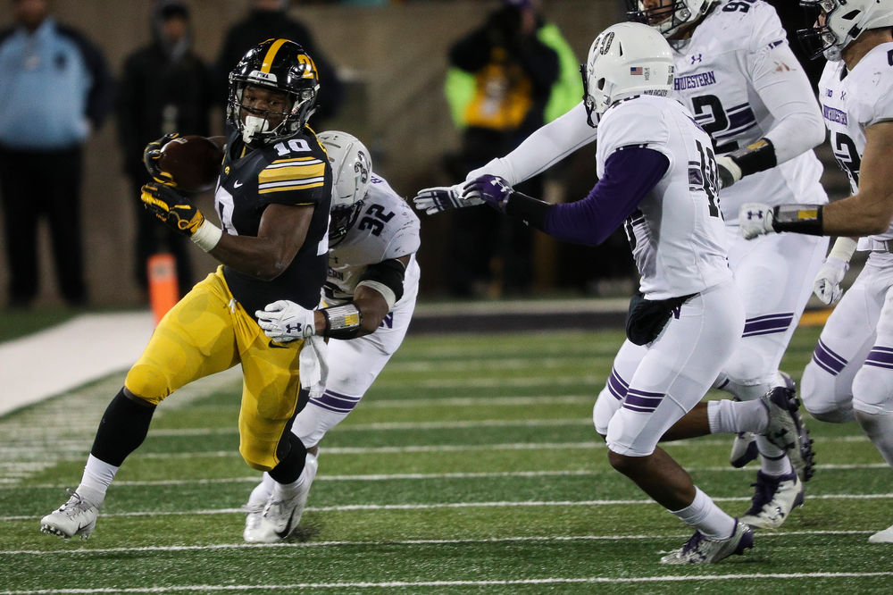 Iowa Hawkeyes running back Mekhi Sargent (10) runs the ball during a game against Northwestern at Kinnick Stadium on November 10, 2018. (Tork Mason/hawkeyesports.com)