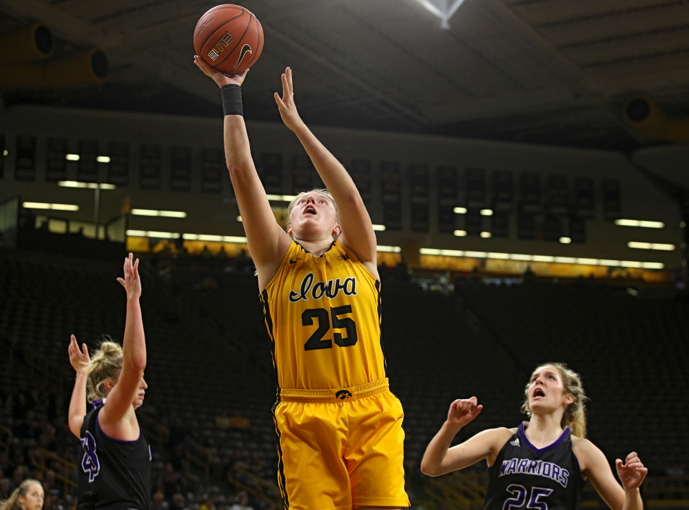 Iowa forward/center Monika Czinano (25) makes a basket during the third quarter of their game against Winona State at Carver-Hawkeye Arena in Iowa City on Sunday, Nov 3, 2019. (Stephen Mally/hawkeyesports.com)