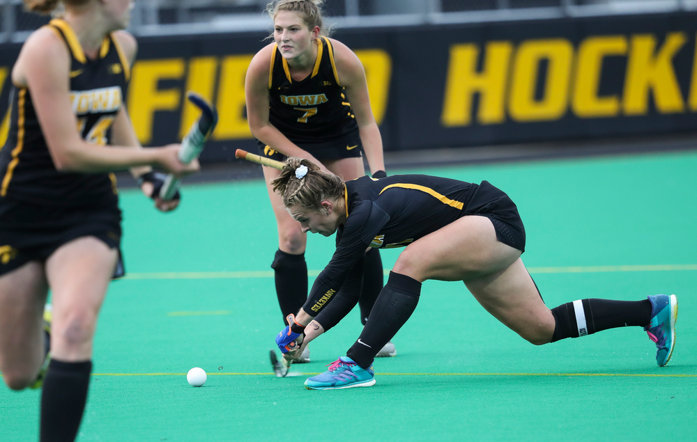 Iowa Hawkeyes midfielder Katie Birch (11) takes a shot on a penalty corner during a game against No. 6 Penn State at Grant Field on October 12, 2018. (Tork Mason/hawkeyesports.com)