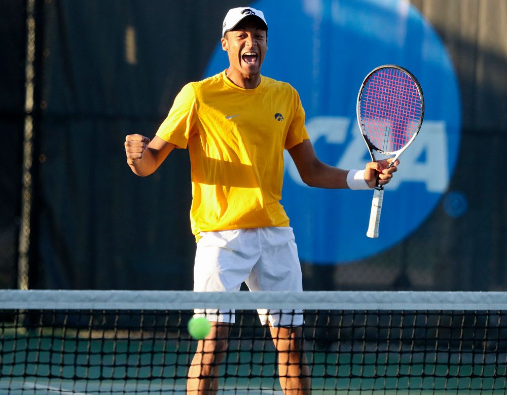 Iowa's Oliver Okonkwo celebrates a point during his match again Michigan State at the Hawkeye Tennis and Recreation Complex in Iowa City on Friday, Apr. 19, 2019. (Stephen Mally/hawkeyesports.com)