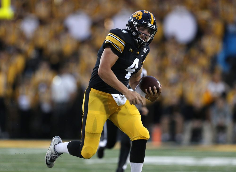 Iowa Hawkeyes quarterback Nate Stanley (4) against the Miami RedHawks Saturday, August 31, 2019 at Kinnick Stadium in Iowa City. (Brian Ray/hawkeyesports.com)