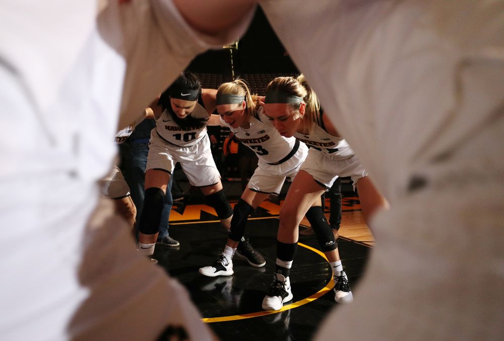 Iowa Hawkeyes forward Megan Gustafson (10), guard Makenzie Meyer (3), and forward Hannah Stewart (21) against the Wisconsin Badgers Monday, January 7, 2019 at Carver-Hawkeye Arena. (Brian Ray/hawkeyesports.com)