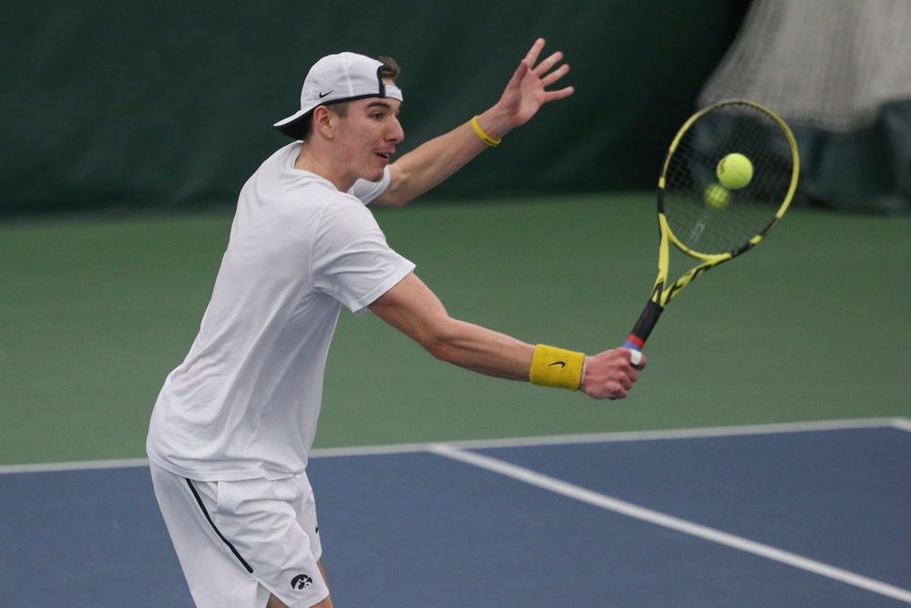 Iowa’s Nikita Snezhko returns a hit during the Iowa men’s tennis meet vs Nebraska on Sunday, March 1, 2020 at the Hawkeye Tennis and Recreation Complex. (Lily Smith/hawkeyesports.com)