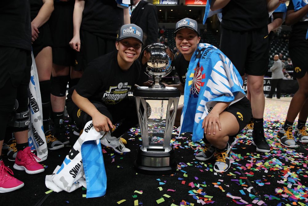 Iowa Hawkeyes guard Tania Davis (11) and guard Zion Sanders (24) celebrate their victory over the Maryland Terrapins in the Big Ten Championship Game Sunday, March 10, 2019 at Bankers Life Fieldhouse in Indianapolis, Ind. (Brian Ray/hawkeyesports.com)