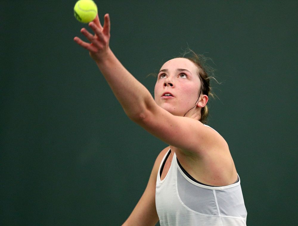 Iowa’s Samantha Mannix serves during her singles match at the Hawkeye Tennis and Recreation Complex in Iowa City on Sunday, February 23, 2020. (Stephen Mally/hawkeyesports.com)