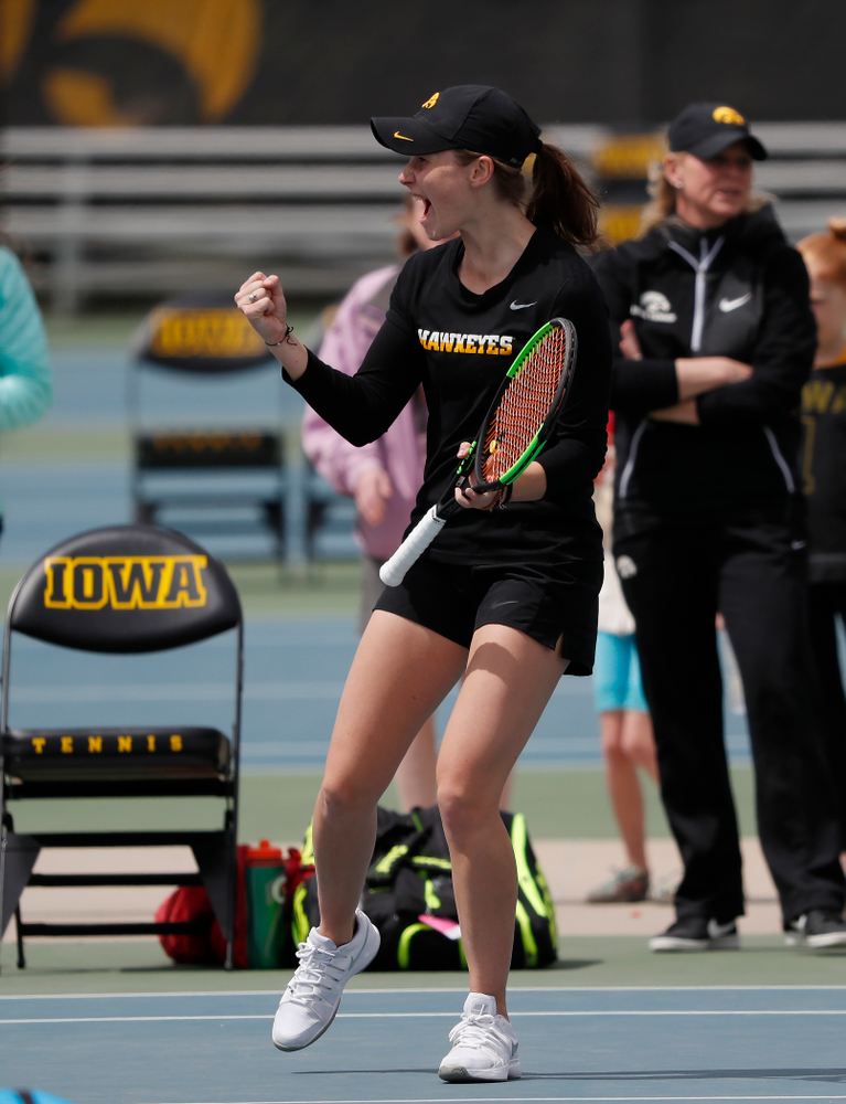 Elise Van Heuvelen and Anastasia Reimchen play a doubles match against the Wisconsin Badgers Sunday, April 22, 2018 at the Hawkeye Tennis and Recreation Center. (Brian Ray/hawkeyesports.com)