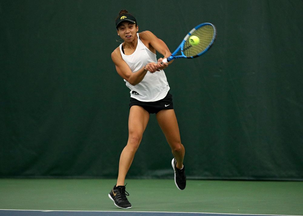 Iowa’s Michelle Bacalla returns a shot during her singles match at the Hawkeye Tennis and Recreation Complex in Iowa City on Sunday, February 23, 2020. (Stephen Mally/hawkeyesports.com)