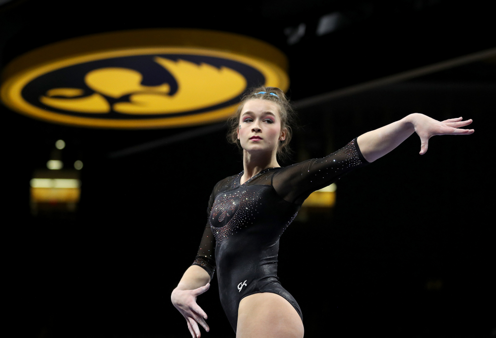 Iowa’s Mackenzie Vance competes on the beam against Michigan Friday, February 14, 2020 at Carver-Hawkeye Arena. (Brian Ray/hawkeyesports.com)