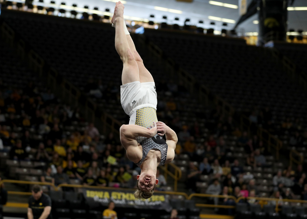 Iowa’s Stewart Brown competes on the floor against UIC and Minnesota Saturday, February 1, 2020 at Carver-Hawkeye Arena. (Brian Ray/hawkeyesports.com)
