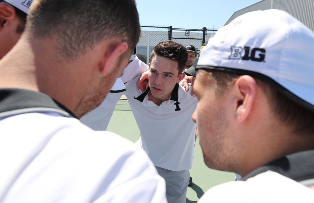 IowaÕs Jonas Larsen pumps up his teammates before their game against the Michigan Wolverines Sunday, April 21, 2019 at the Hawkeye Tennis and Recreation Complex. (Brian Ray/hawkeyesports.com)