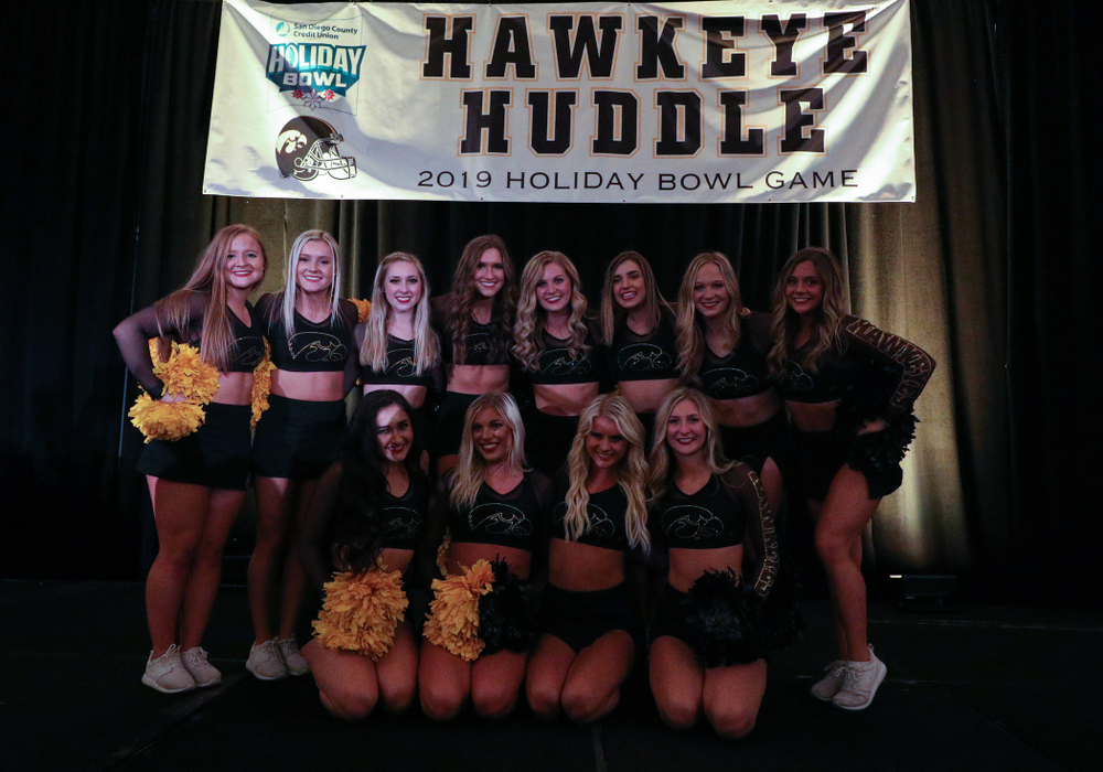 The Hawkeye Marching Band and the Iowa Spirit Squads perform during the Holiday Bowl Hawkeye Huddle Thursday, December 26, 2019 at the Hilton in downtown San Diego. (Brian Ray/hawkeyesports.com)