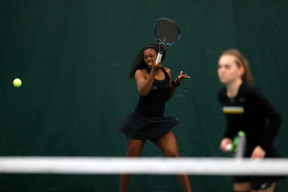 Adorable Huckleby and Zoe Douglas play a doubles match against Ohio State Sunday, March 25, 2018 at the Hawkeye Tennis and Recreation Center. (Brian Ray/hawkeyesports.com)