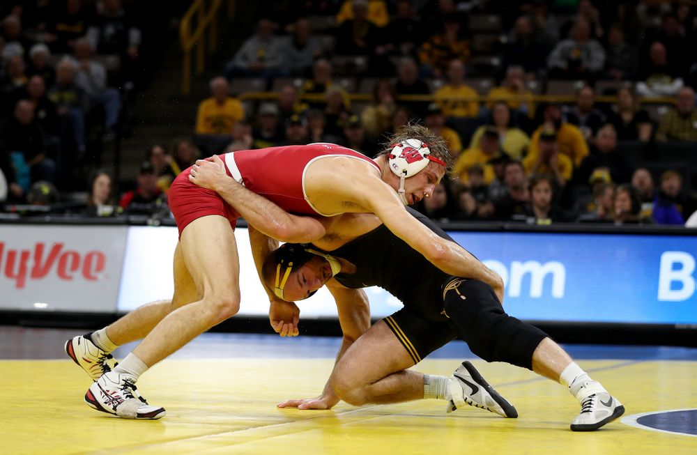IowaÕs Alex Marinelli wrestles WisconsinÕs Evan Wick at 165 pounds Sunday, December 1, 2019 at Carver-Hawkeye Arena. Marinelli won the match 4-2. (Brian Ray/hawkeyesports.com)