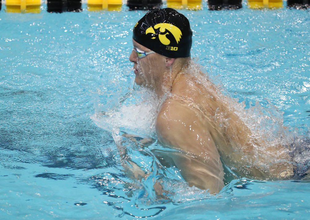 IowaÕs Will Myhre swims the breaststroke leg of the 200 Medley Relay against Notre Dame and Illinois Saturday, January 11, 2020 at the Campus Recreation and Wellness Center. (Brian Ray/hawkeyesports.com)