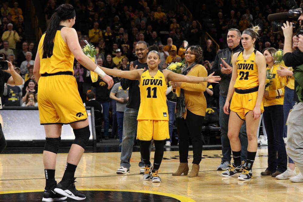 Iowa Hawkeyes forward Megan Gustafson (10), guard Tania Davis (11), and forward Hannah Stewart (21) during senior day ceremonies following their game against the Northwestern Wildcats Sunday, March 3, 2019 at Carver-Hawkeye Arena. (Brian Ray/hawkeyesports.com)
