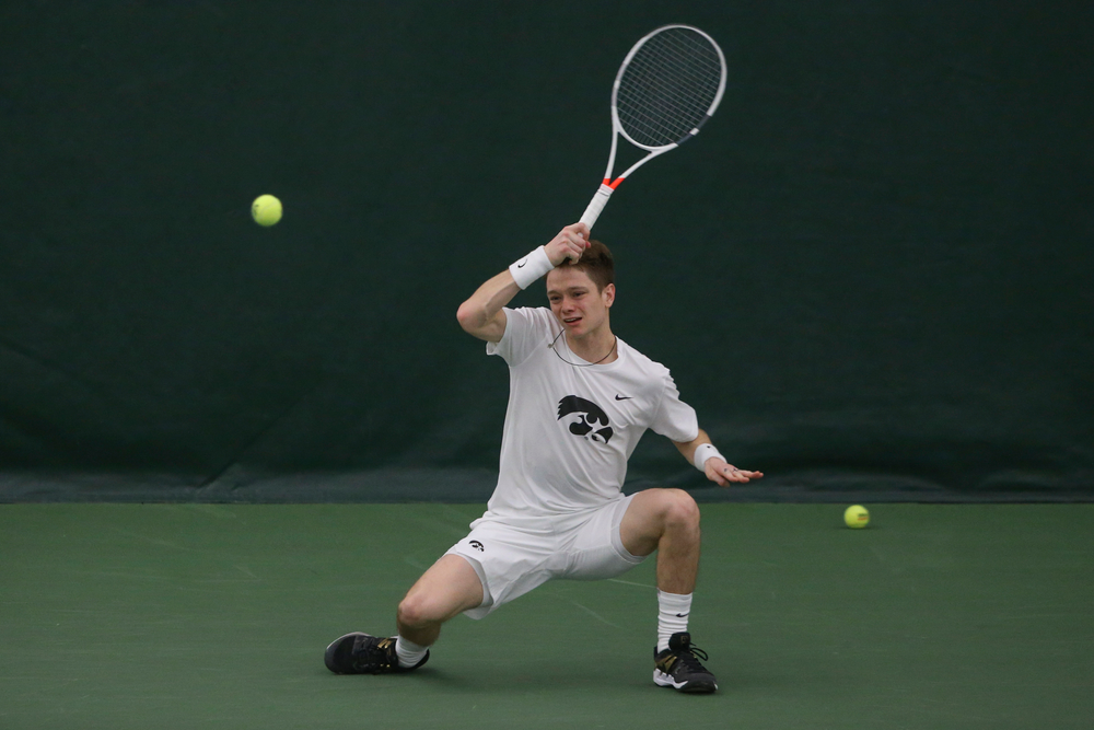 Iowa’s Jason Kerst returns a hit during the Iowa men’s tennis meet vs Nebraska on Sunday, March 1, 2020 at the Hawkeye Tennis and Recreation Complex. (Lily Smith/hawkeyesports.com)