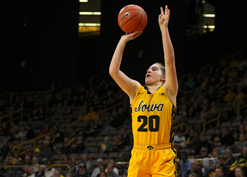 Iowa guard Kate Martin (20) puts up a shot during the third quarter of their game against Winona State at Carver-Hawkeye Arena in Iowa City on Sunday, Nov 3, 2019. (Stephen Mally/hawkeyesports.com)