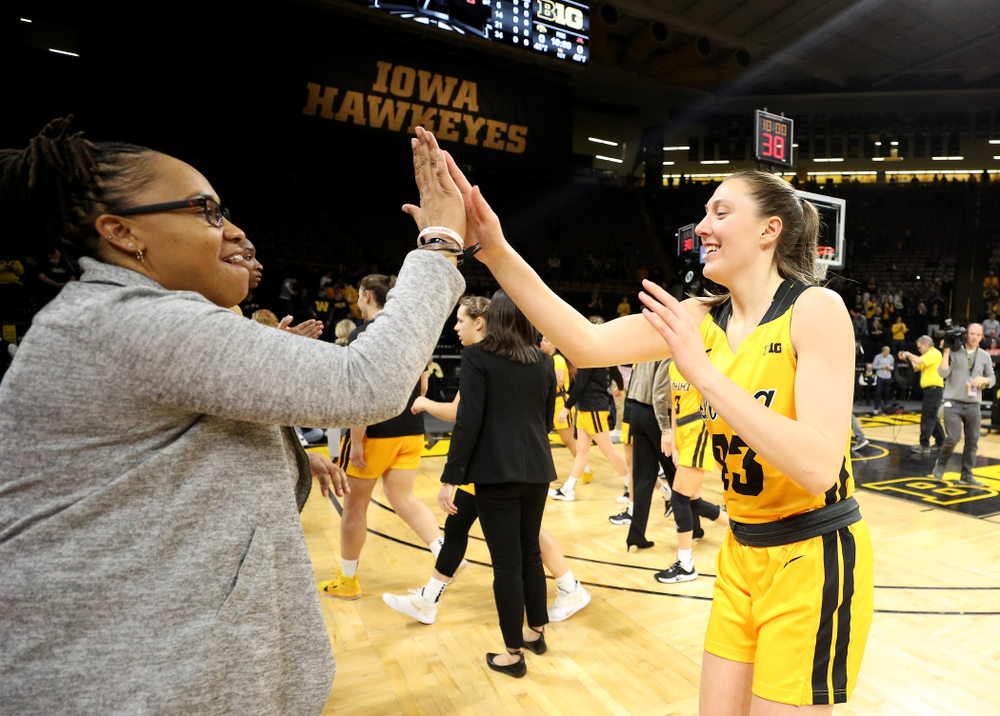 Iowa Hawkeyes forward Amanda Ollinger (43) and assistant coach Raina Harmon against the Minnesota Golden Gophers Thursday, February 27, 2020 at Carver-Hawkeye Arena. (Brian Ray/hawkeyesports.com)