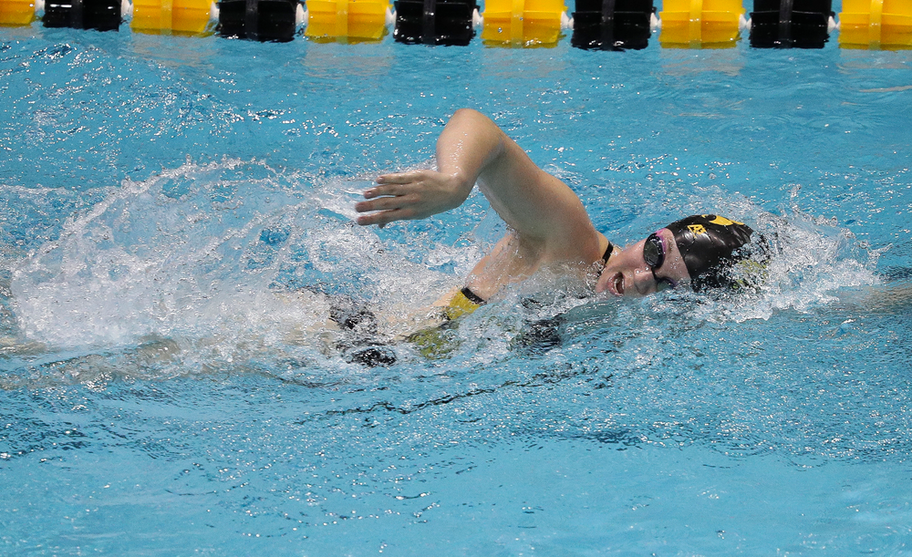 Iowa's Alleyne Thomas competes in the 500-yard freestyle during a meet against Michigan and Denver at the Campus Recreation and Wellness Center on November 3, 2018. (Tork Mason/hawkeyesports.com)