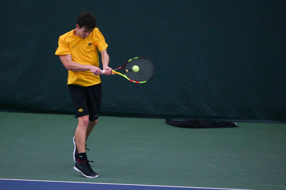 Iowa's Joe Tyler at a tennis match vs Drake Friday, March 8, 2019 at the Hawkeye Tennis and Recreation Complex. (Lily Smith/hawkeyesports.com)
