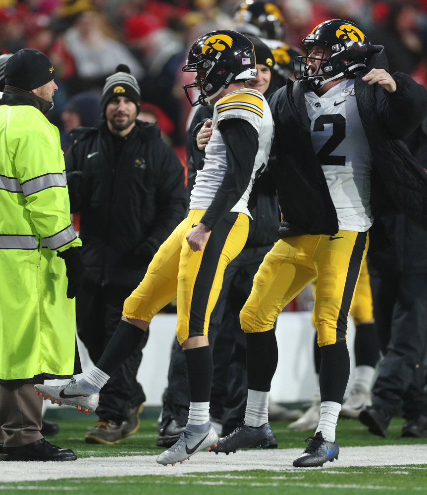 Iowa Hawkeyes place kicker Keith Duncan (3) celebrates with punter Michael Sleep-Dalton (22) after kicking the game winning field goal against the Nebraska Cornhuskers Friday, November 29, 2019 at Memorial Stadium in Lincoln, Neb. (Brian Ray/hawkeyesports.com)