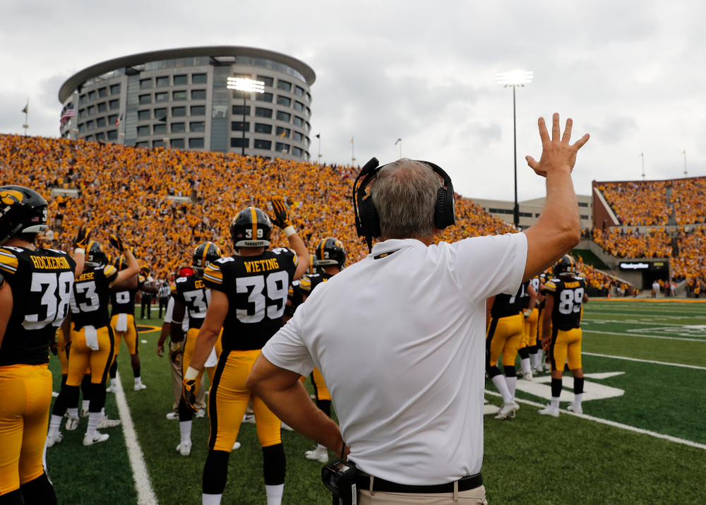 Iowa Hawkeyes head coach Kirk Ferentz waves to the Stead Family Children's Hospital during their game against the Northern Illinois Huskies Saturday, September 1, 2018 at Kinnick Stadium. (Brian Ray/hawkeyesports.com)