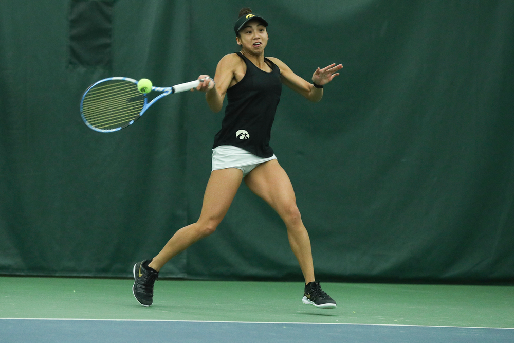 Iowa’s Michelle Bacalla returns a hit during the Iowa women’s tennis meet vs DePaul on Friday, February 21, 2020 at the Hawkeye Tennis and Recreation Complex. (Lily Smith/hawkeyesports.com)