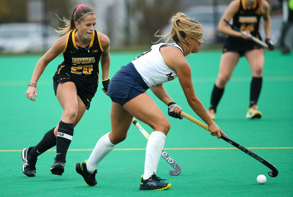 Iowa Hawkeyes midfielder Sophie Sunderland (20) defends during a game against Michigan at Grant Field on October 5, 2018. (Tork Mason/hawkeyesports.com)