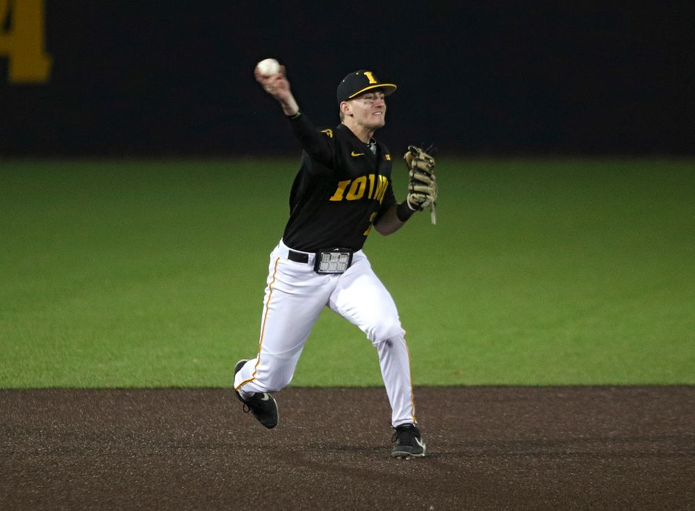 Iowa infielder Brendan Sher (2) throws to first for an out during the seventh inning of their game at Duane Banks Field in Iowa City on Tuesday, March 3, 2020. (Stephen Mally/hawkeyesports.com)