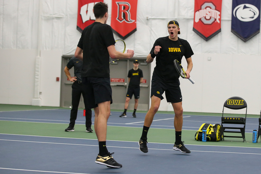 Iowa’s Matt Clegg and Joe Tyler celebrate a point during the Iowa men’s tennis meet vs VCU on Saturday, February 29, 2020 at the Hawkeye Tennis and Recreation Complex. (Lily Smith/hawkeyesports.com)