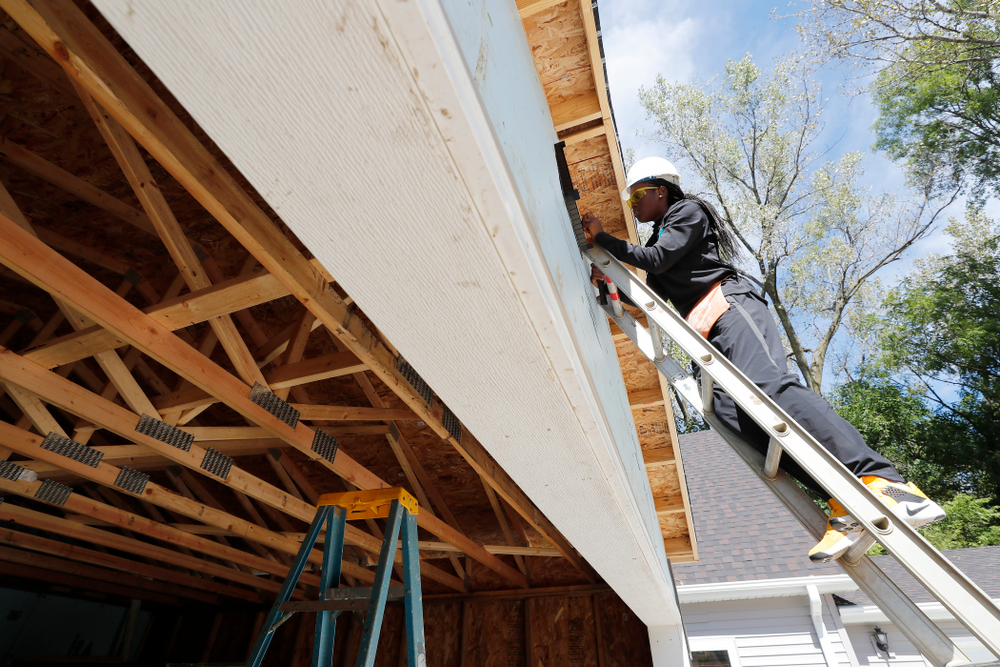 Iowa Hawkeyes guard Tomi Taiwo (1) works on the Habitat for Humanity Women's Build Wednesday, September 26, 2018 in Iowa City. (Brian Ray/hawkeyesports.com)